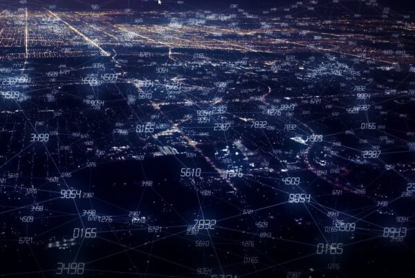 Digital Illustration - still image - image of numbers overlaid on an aerial view of a city at night- used for the AI Blockchain Sensor and Sensor Systems (Patent-Pending) project